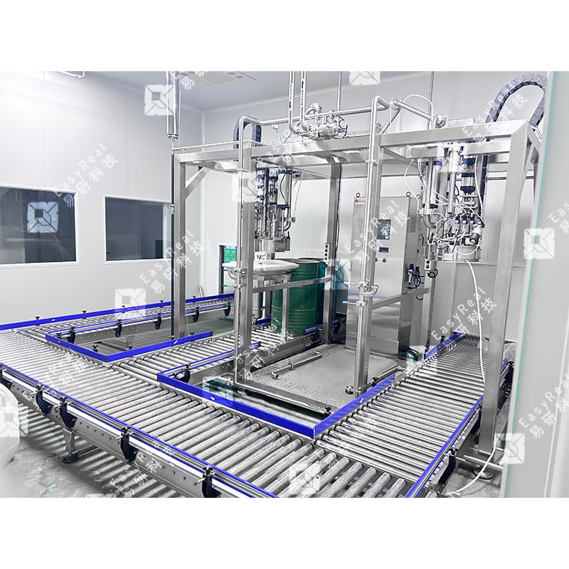 Stainless steel drum roller conveyor around an aseptic bag filling station
